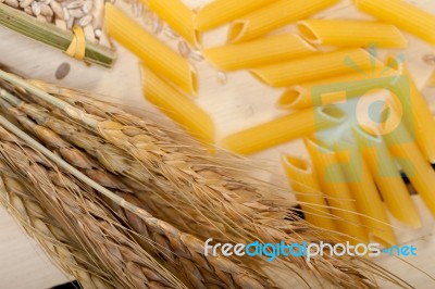 Italian Pasta Penne With Wheat Stock Photo