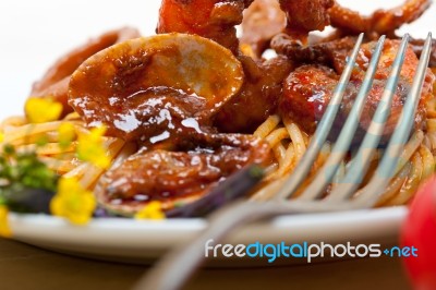 Italian Seafood Spaghetti Pasta On Red Tomato Sauce Stock Photo
