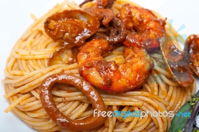 Italian Seafood Spaghetti Pasta On Red Tomato Sauce Stock Photo