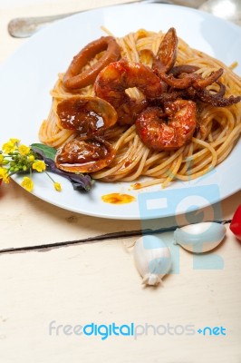 Italian Seafood Spaghetti Pasta On Red Tomato Sauce Stock Photo