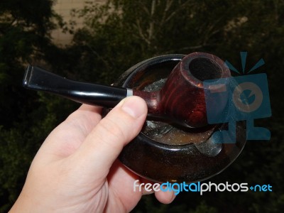 Items For Smoking Pipes And Cigarettes, Lighters, Matches  Stock Photo
