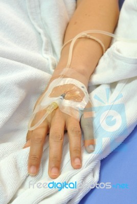 IV Solution In Patients Hand Stock Photo