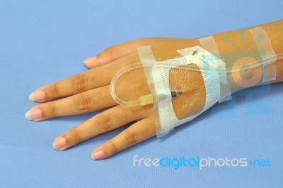 Iv Solution In Patients Hand Stock Photo