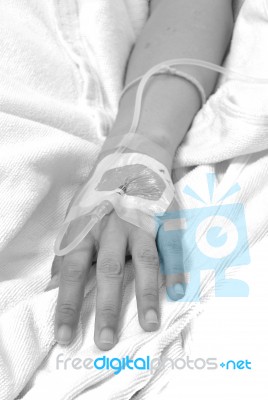 Iv Solution In Patients Hand Stock Photo