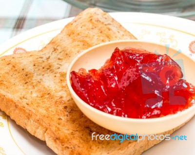 Jam And Toast Shows Meal Time And Butter Stock Photo