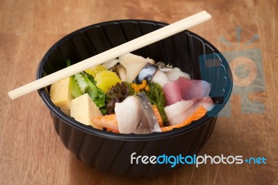 Japanese Food Tekka Don Take Away On Wooden Background Stock Photo