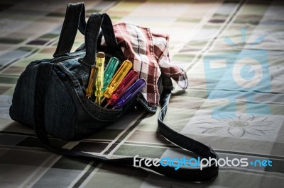 Jeans Handbag On The Mattress Stock Photo