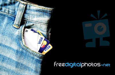 Jeans Lack And And Credit Card On The Wooden Floor Stock Photo