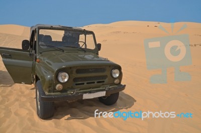 Jeep Car On Desert Stock Photo