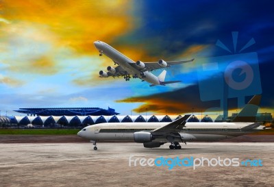 Jet Plane Flying Over Runways And Beautiful Dusky Sky With Copy Stock Photo Jet Plane Flying Over Runways And Beautiful Dusky Sky With Copy Stock Photo