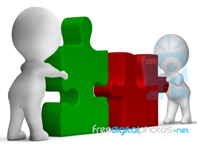 Jigsaw Pieces Being Joined Showing Teamwork And Collaboration Stock Image