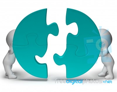 Jigsaw Pieces Being Joined Showing Teamwork And Togetherness Stock Image