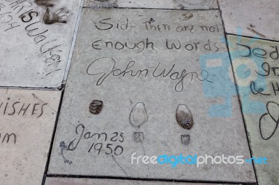 John Wayne Footprints And Signature Hollywood Stock Photo