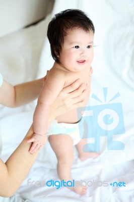 Joyful Happy Mom And Baby Stock Photo