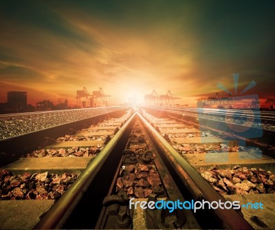 Junction Of Railways Track In Trains Station Agains Beautiful Light Of Sun Set Sky Use For Land Transport And Logistic Industry Background ,backdrop,copy Space Theme Stock Photo