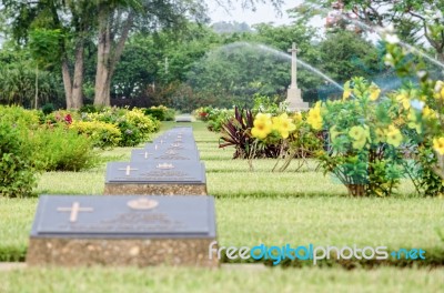 Kanchanburi, Thailand - May 3, 2014: Chungkai War Cemetery This Is Historical Monuments Where To Respect Prisoners Of The World War 2 Rest In Peace Here In Kanchanaburi Province, Thailand Stock Photo