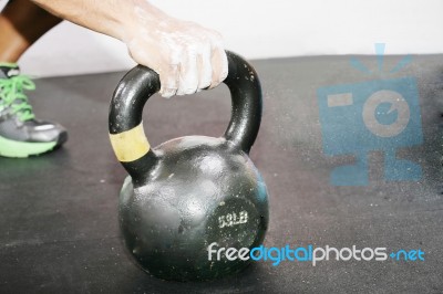 Kettlebell Crossfit Workout On The Gym Stock Photo