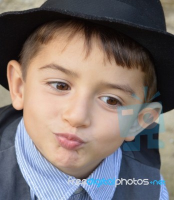 Kid Gives A Kiss Stock Photo