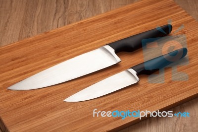 Knives On Cutting Board Stock Photo