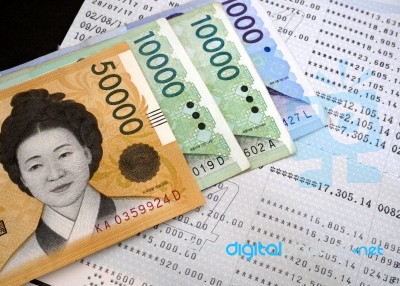 Korean Banknote On Bank Statement Stock Photo