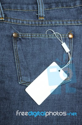 Label Tied With Blue Jeans Stock Photo