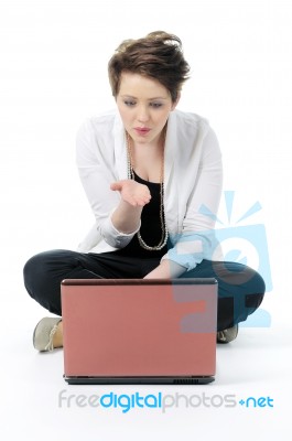 Lady Blowing Kisses With Laptop Stock Photo