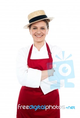 Lady Chef Standing With Crossed Arm Stock Photo