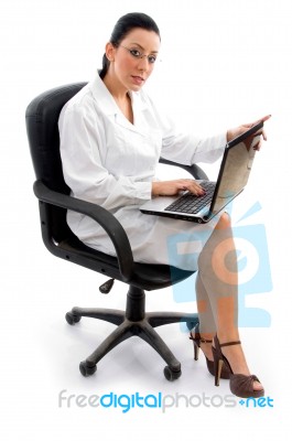 Lady Doctor Doing Work On Laptop Stock Photo