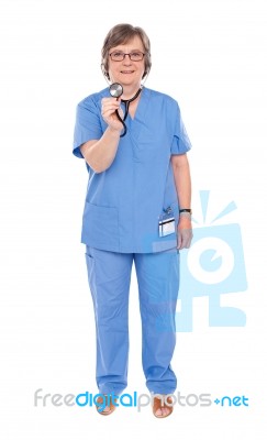 Lady Doctor Posing With Stethoscope Stock Photo