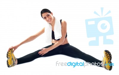 Lady Doing Stretching Exercise Stock Photo