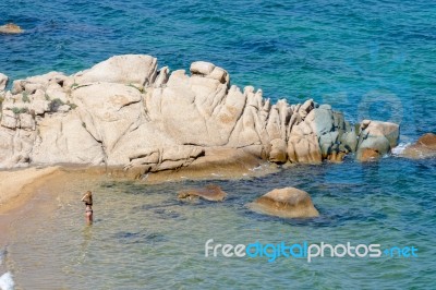 Lady In The Sea Cala Dei Ginepri In Sardinia Stock Photo