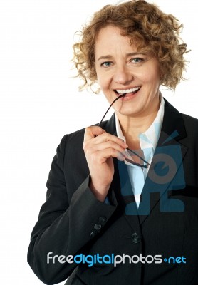 Lady Posing With Glasses Stock Photo