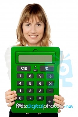 Lady Showing Big Green Calculator Stock Photo