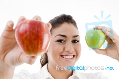 Lady Showing Green And Red Apples Stock Photo