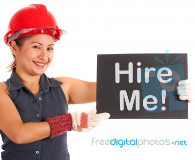 Lady Showing Hire Me Board Stock Photo