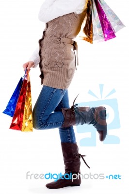 Lady Standing With Shopping Bags Stock Photo