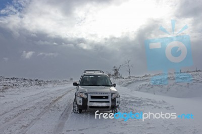Landrover Freelander In Snow Stock Photo