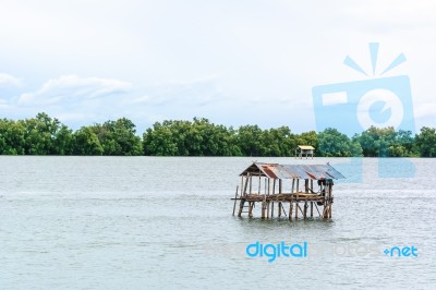 Landscape Fishing Cottage In Sea  Stock Photo