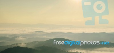 Landscape Of Mountain With The Clouds And Fog Stock Photo