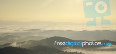 Landscape Of Mountain With The Clouds And Fog Stock Photo