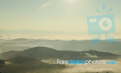 Landscape Of Mountain With The Clouds And Fog Stock Photo
