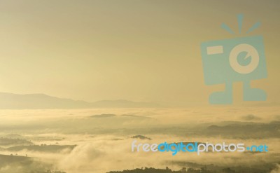 Landscape Of Mountain With The Clouds And Fog Stock Photo