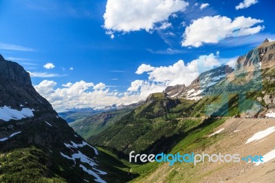 Landscape View In Glacier National Park At Logan Pass Stock Photo