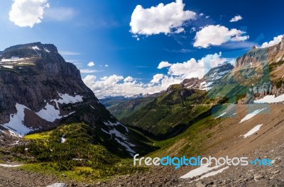 Landscape View In Glacier National Park At Logan Pass Stock Photo