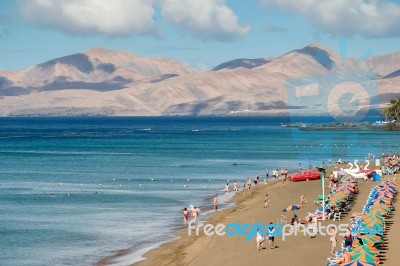 Lanzarote, Canary Islands/spain - July 30 : People Relaxing On A… Stock Photo