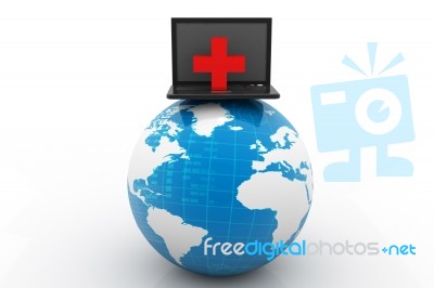 Laptop With A First Aid Kit And Globe Stock Image