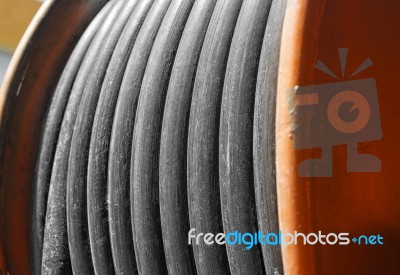 Large Metal Coil With Electric Cable Stock Photo