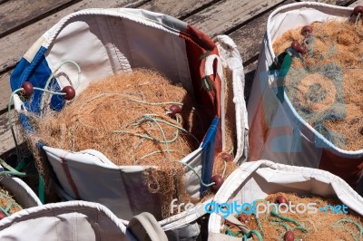 Latchi, Cyprus/greece - July 23 : Bags Of Fishing Nets On The Je… Stock Photo