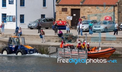 Launching The Lifeboat At Staithes Stock Photo