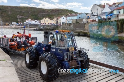 Launching The Lifeboat At Staithes North Yorkshire Stock Photo